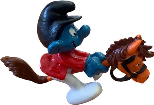 Smurf met Hobbelpaard - Schleich paard - Speelfiguurtje - 40214